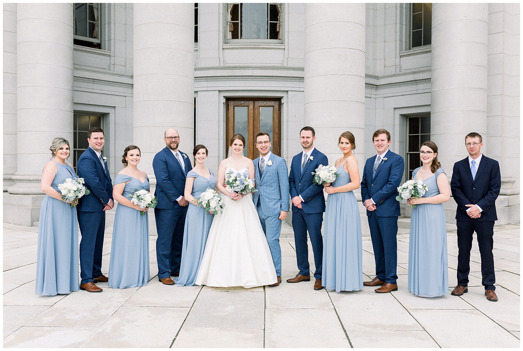 long blue bridesmaid dress and blue groomsmen suits bridal party